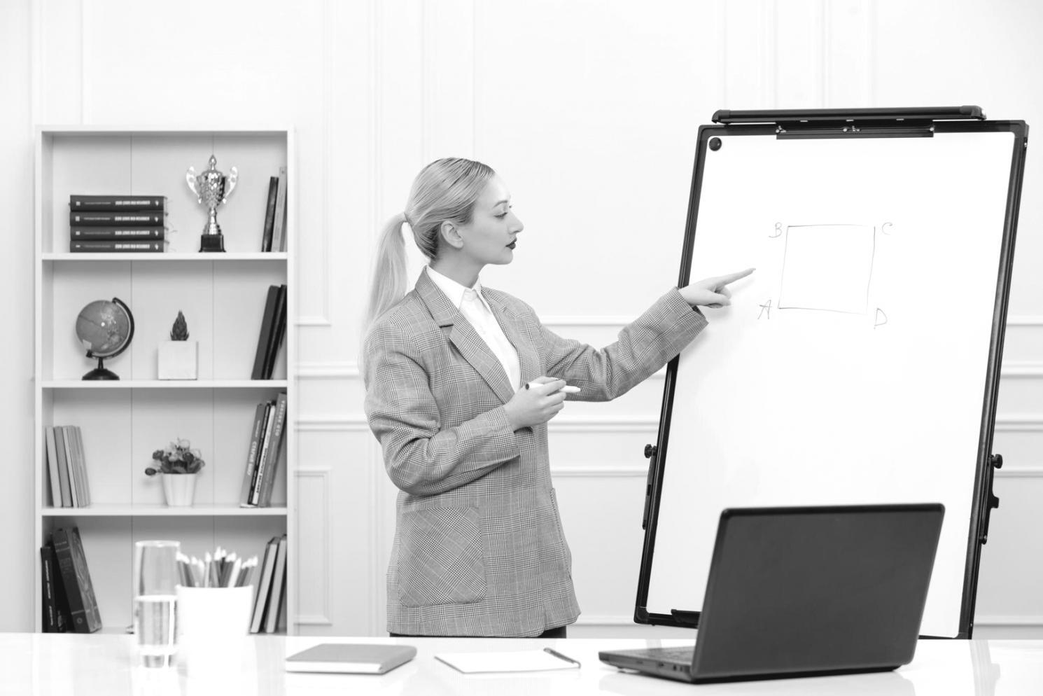 Financial professional reviewing market analysis reports and charts